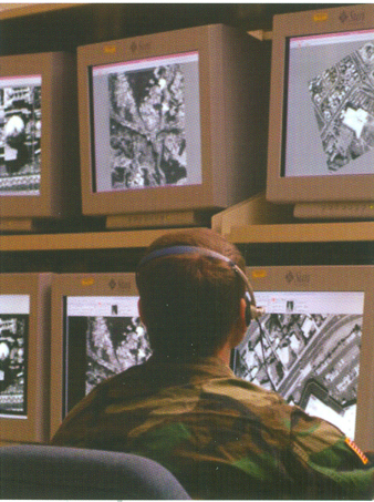 Soldier Monitoring Computer Screens