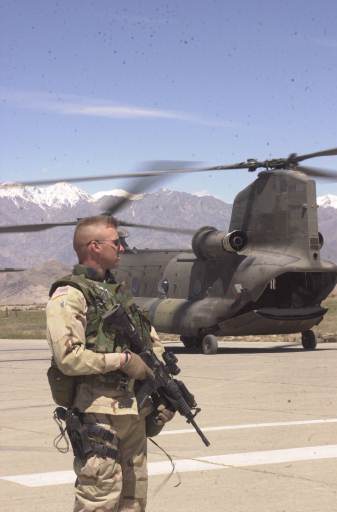 Solder in Front of Helicopter